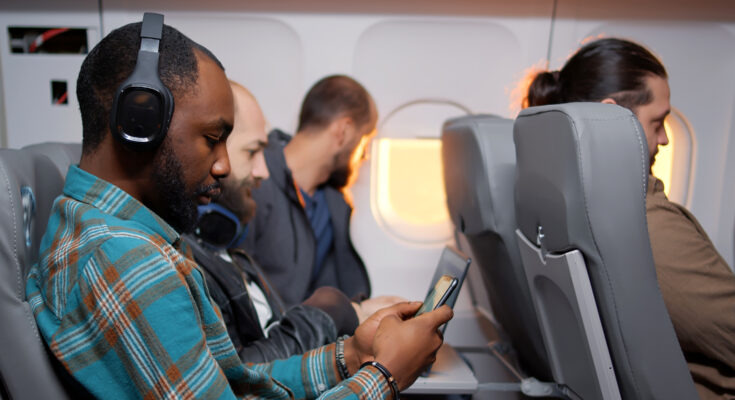 A man on a flight | Source: Shutterstock