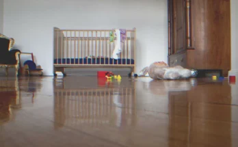 A baby cot in an empty room | Source: Getty Images