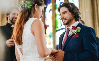 A couple at the altar | Source: Shutterstock