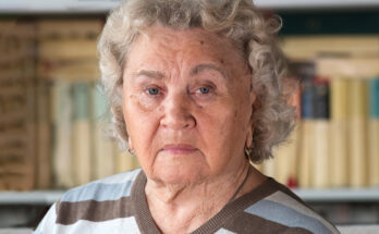 A stern-looking woman facing the camera | Source: Shutterstock