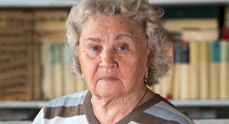 A stern-looking woman facing the camera | Source: Shutterstock