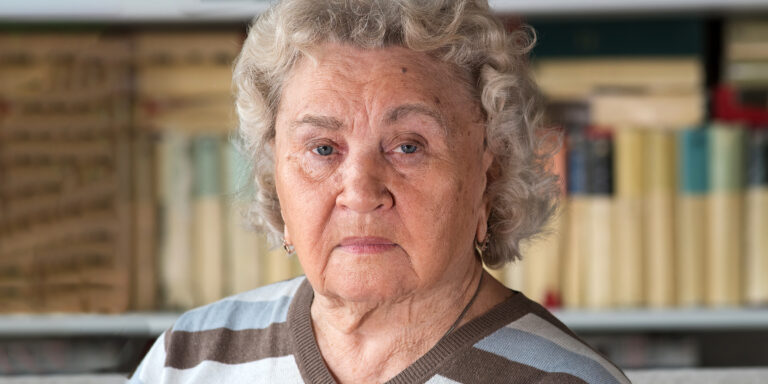 A stern-looking woman facing the camera | Source: Shutterstock