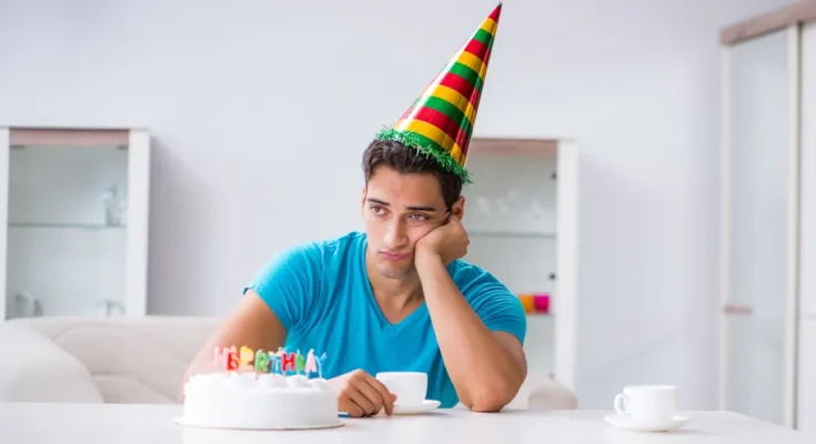 A boy feeling sad on his birthday | Source: Shutterstock