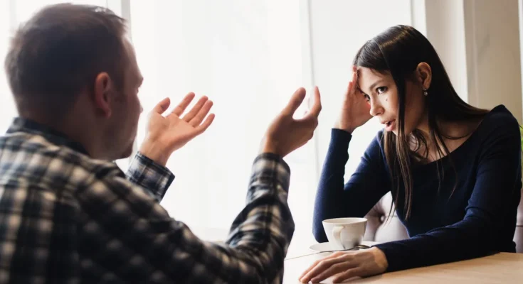 A man and a woman during a discussion | Source: Shutterstock