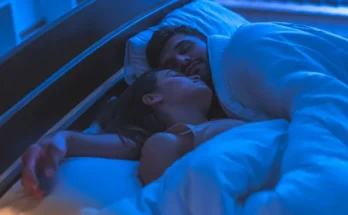 A couple fast asleep in bed | Source: Shutterstock