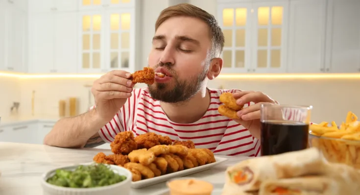 Man eating | Source: Shutterstock