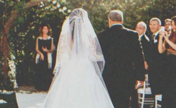 A man walking a bride down the aisle for her wedding | Source: Shutterstock