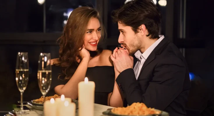 A couple sitting at a restaurant | Source: Shutterstock