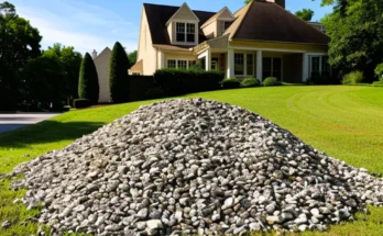 Pile of gravel dumped on lush green lawn | Source: AmoMama