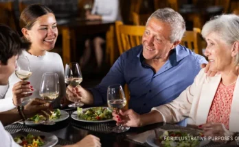 Two couples dining | Source: Shutterstock