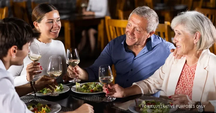 Two couples dining | Source: Shutterstock