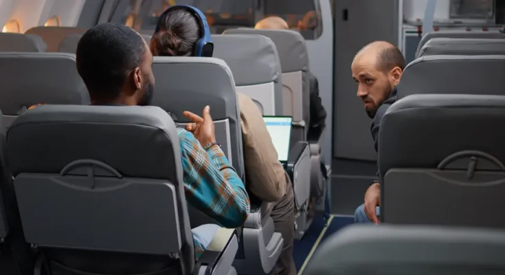 Passengers in an airplane | Source: Freepik/dcstudio