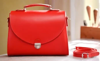 A red purse on a table | Source: Shutterstock