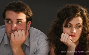 Bored couple sitting at a bar | Source: Getty Images