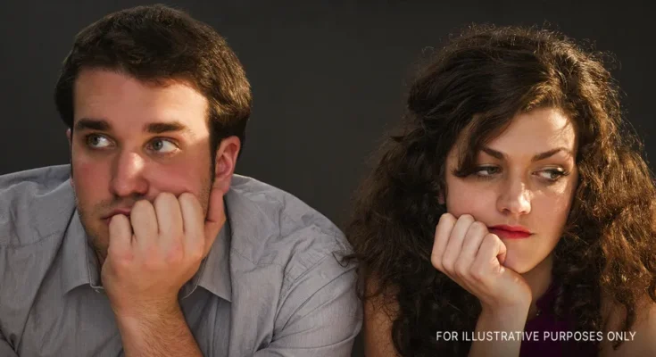 Bored couple sitting at a bar | Source: Getty Images