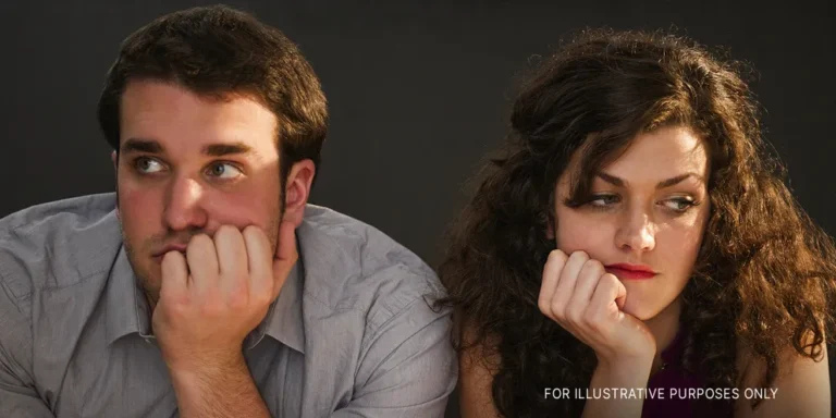 Bored couple sitting at a bar | Source: Getty Images