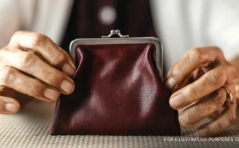 Woman holding a wallet | Source: Getty Images