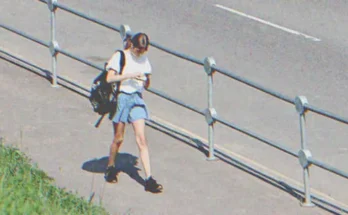 A girl walking on the street | Source: Shutterstock