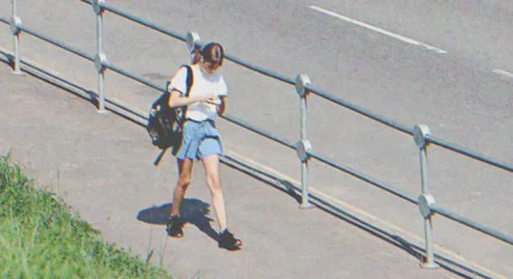 A girl walking on the street | Source: Shutterstock