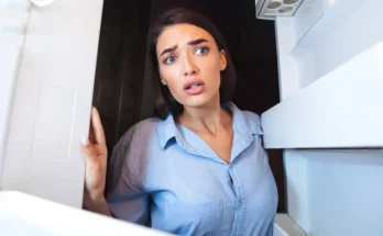 A woman looking inside a fridge | Source: Shutterstock