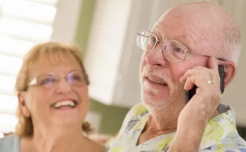 An elderly man on the phone | Source: Shutterstock