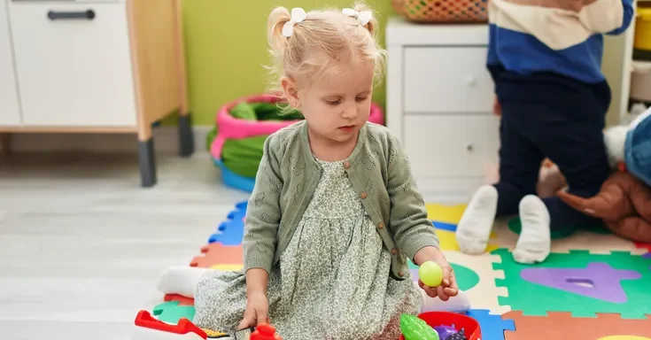 A little girl in a daycare center | Source: Shutterstock