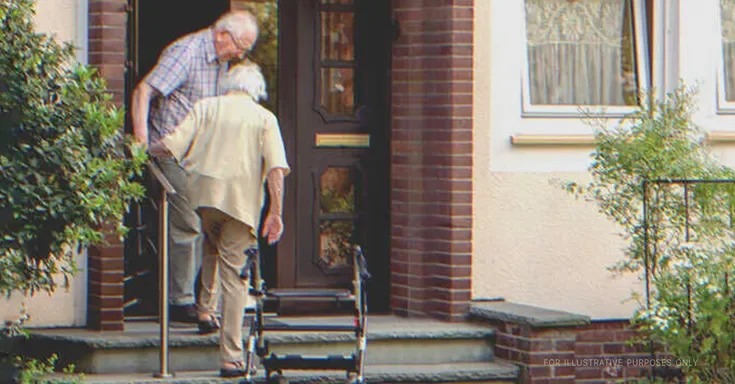 Elderly couple at doorway | Source: Shutterstock