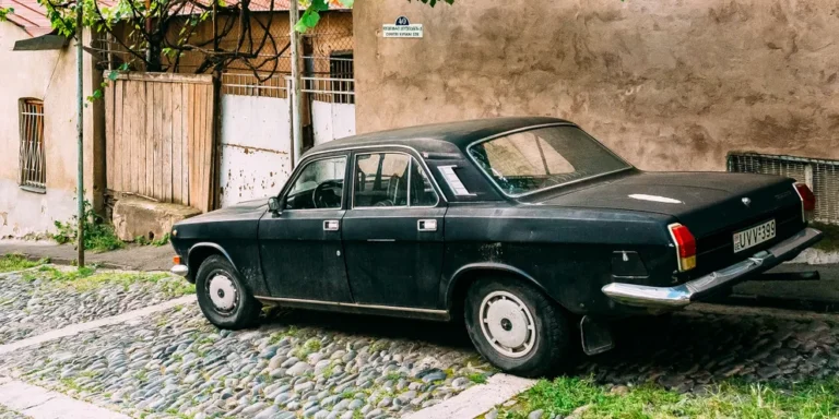 An old car parked outside | Source: Shutterstock