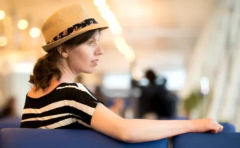 A woman sitting at the airport | Source: Shutterstock