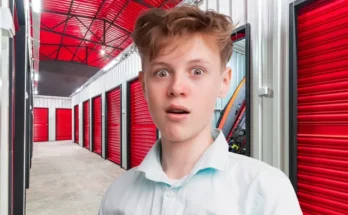 A shocked teenage boy in a storage room | Source: Shutterstock