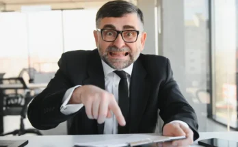 An angry boss in his office | Source: Shutterstock