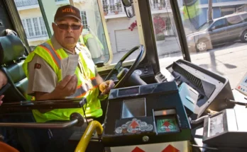 An old bus driver behind the wheel | Source: Shutterstock