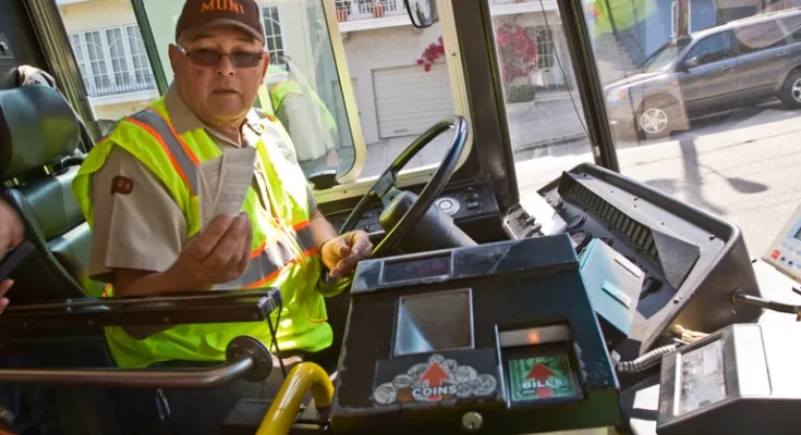 An old bus driver behind the wheel | Source: Shutterstock