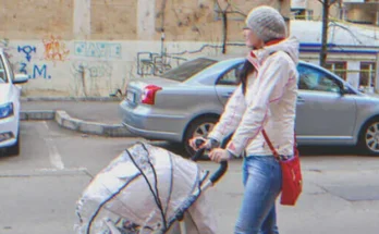 Girl pushing a baby Stroller | Source: Shutterstock