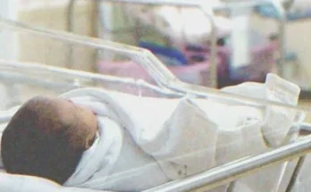 A baby sleeping on a crib | Source: Shutterstock