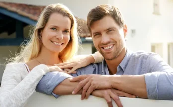 A smiling man and woman | Source: Shutterstock