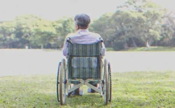 A man in a wheelchair | Source: Shutterstock