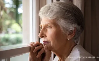 A senior woman looking out the window | Source: Getty Images