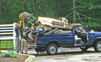 Men unloading furniture from a moving truck | Source: Flickr/cambodia4kidsorg (CC BY 2.0)