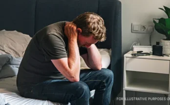 Stressed man seated on the bed | Source: Getty Images