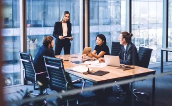 Office workers having a meeting | Source: Shutterstock