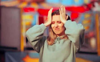 A worried woman at an amusement park | Source: Getty Images