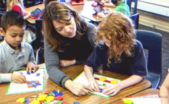 Teacher Helping Her Students. | Source: Getty Images