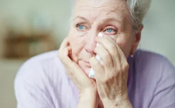 A senior woman wiping her tears | Source: Getty Images