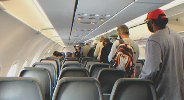 Passengers deboarding a plane | Source: Shutterstock