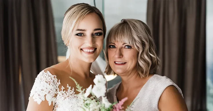 A smiling bride with her mother | Source: Shutterstock