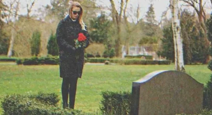 A woman in a graveyard | Source: Shutterstock