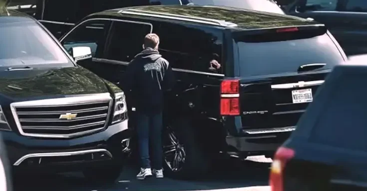 A teen boy getting into an SUV | Source: Amomama