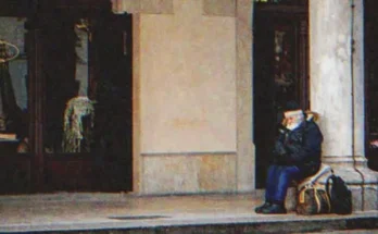 Old man sitting outside a building | Source: Shutterstock