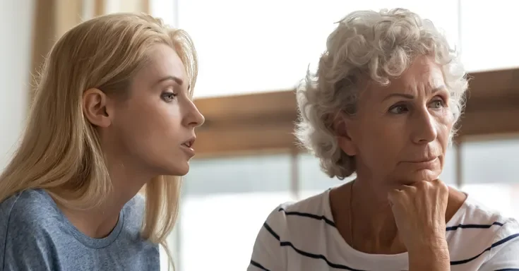 A woman talking to her mother | Source: Shutterstock